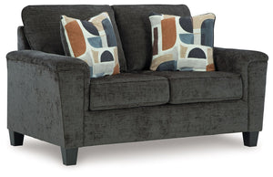 Thereâ€™s something about this loveseat thatâ€™s so easy to appreciate. Maybe itâ€™s the plush upholstery and soothing tone, eager to support your quest for total relaxation. Perhaps it-'s the modern flair of its simple lines, tapered legs and abstract-pa