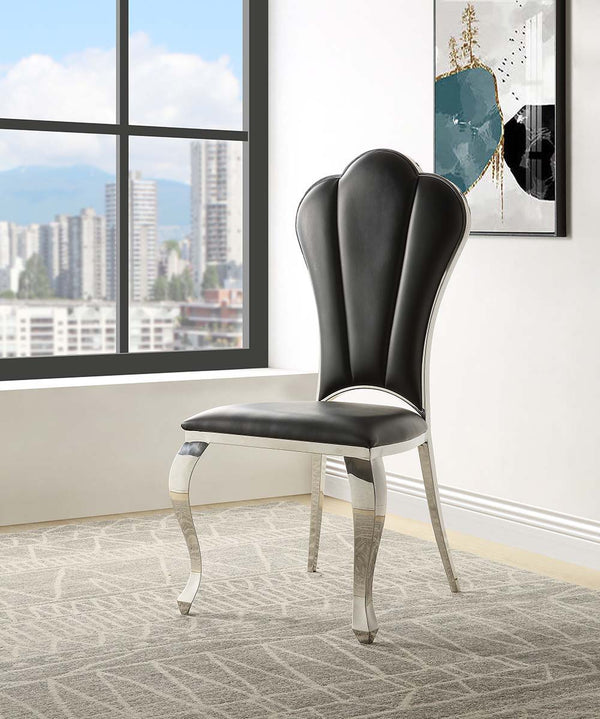 The Cyrene side chairs offer a visually stunning place to sit on and enjoy meals. The chairs are beautifully scalloped and are accentuated with a shiny stainless-steel frame. The black PU upholstery is SOFT and stylish. The padded seats offer plenty of su