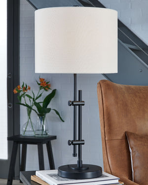  and is adjustable to provide targeted illumination. Topped off with a crisp white drum shade