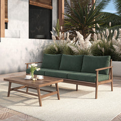 The Ashton 2-Piece Patio Set, featuring a stylish outdoor sofa with moss green cushions and a matching coffee table, seamlessly blends durability, comfort, and timeless design to create the ultimate outdoor retreat. Expertly crafted from FSC-Certified Aca