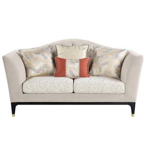  the seat cushions are upholstered in a geometric fabric. The black base and fee