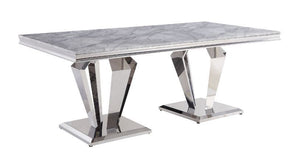 Contemporary flair graces classic silhouettes to create a timeless design that will blend with any home style. The stainless steel pedestals base features sleek, uncluttered lines in geometric form, with mirrored silver finish emitting a modern glitter. L