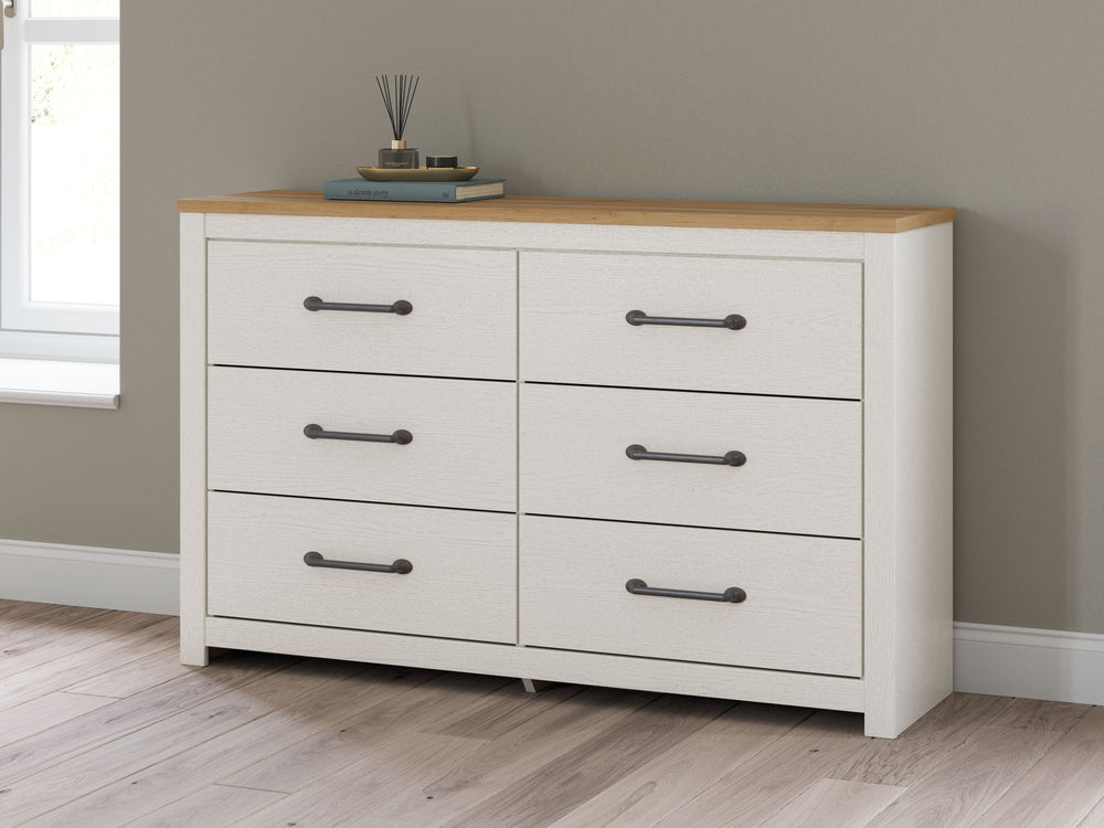 Create a serene countryside retreat with this dresser. The two-tone design effortlessly adds farmhouse style, while framed drawer fronts with pewter-tone handles enhance its charming appeal. Looking for furniture that offers storage and a peaceful escape 