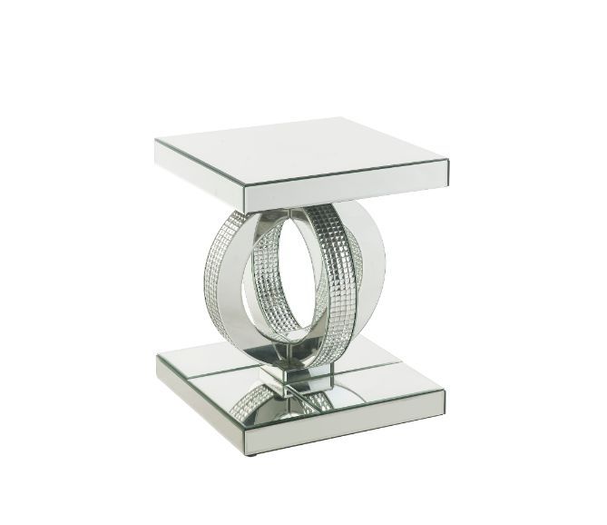 Make a striking statement in your home with this Ornat End Table. Featuring mirrored frame with faux diamond inlay, it creates a bold, yet elegant textured look. Classic pedestal base gives it an elegant support, with spectacular faux diamonds inlay addin