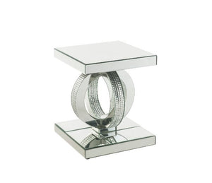 Make a striking statement in your home with this Ornat End Table. Featuring mirrored frame with faux diamond inlay, it creates a bold, yet elegant textured look. Classic pedestal base gives it an elegant support, with spectacular faux diamonds inlay addin