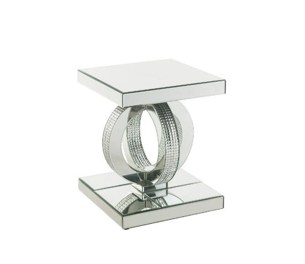 Make a striking statement in your home with this Ornat End Table. Featuring mirrored frame with faux diamond inlay, it creates a bold, yet elegant textured look. Classic pedestal base gives it an elegant support, with spectacular faux diamonds inlay addin