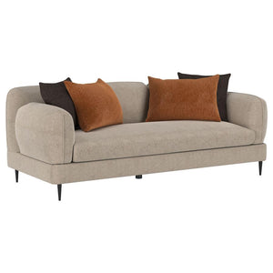 Experience a sophisticated blend of architectural design and plush comfort with this sofa. The latte chenille upholstery provides a subtle textured appeal, complemented by sculpted round arms and a matching back that mirror each otherâ€™s clean lines. Its