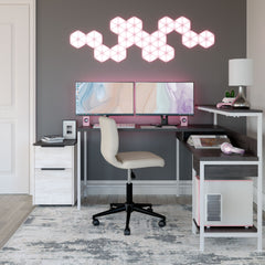 More than just a beauty to behold, this home office L-desk is designed to raise your productivity by packing more work area into less space. Sporting a two-tone finish, itâ€™s ready to take a cool stance for modern farmhouse style. Pair with the bookcase 