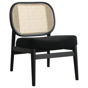 This accent chairs introduces a warm, airy presence to any living area. Lounge chair features a rattan open cane webbing back that breathes natural style and a fabric upholstered cushioned seat for soft, supportive comfort. The solid hardwood frame provid