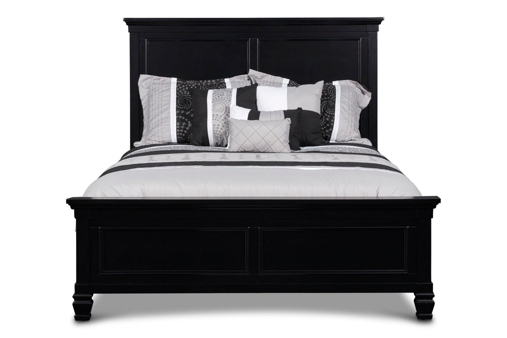 The Tamarack Wood Panel Bed in Black is a true standout, showcasing durable construction with a blend of solid poplar, basswood veneers, and eco-friendly manufactured wood for unmatched strength and longevity. This bed-'-'s versatile transitional style ma