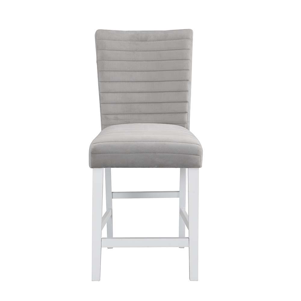 Perfect for a kitchen nook or a smaller dining space, the Elizaveta counter height dining table will fulfill all your dining needs. The white high gloss finish blends in perfectly with the glimmering faux diamond inlay base. The tabletop features silver a