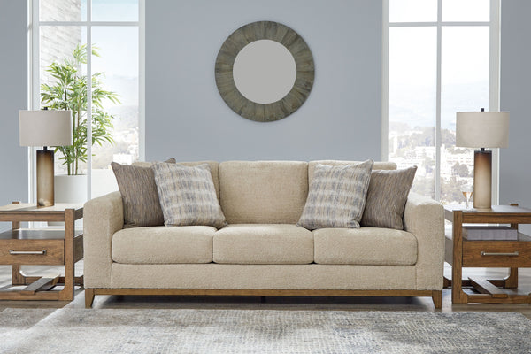  showcasing soft neutral upholstery accented with a transitional wood trim. As