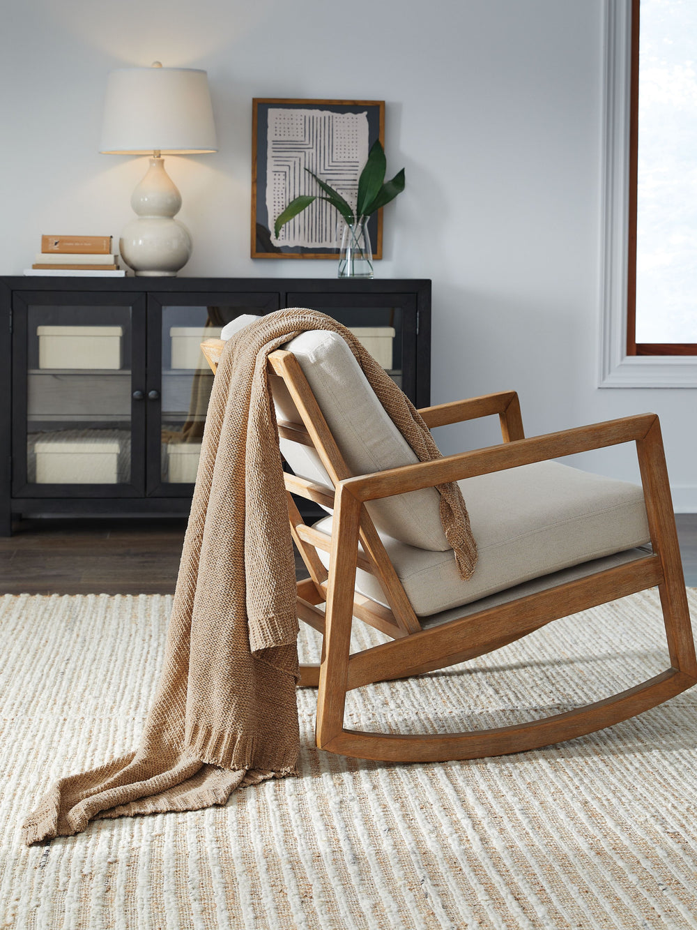 Comfort meets casually chic style in this throw blanket. Its gold hue and knitted construction create trendy textural variation when draped over a sofa or the foot of a bed. And it goes beyond style, with the soft chenille fabric acting as a cozy companio