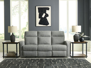  made easy. This reclining sofa takes you back to the basics with simply stylish comfort. With an easygoing neutral hue and classic design