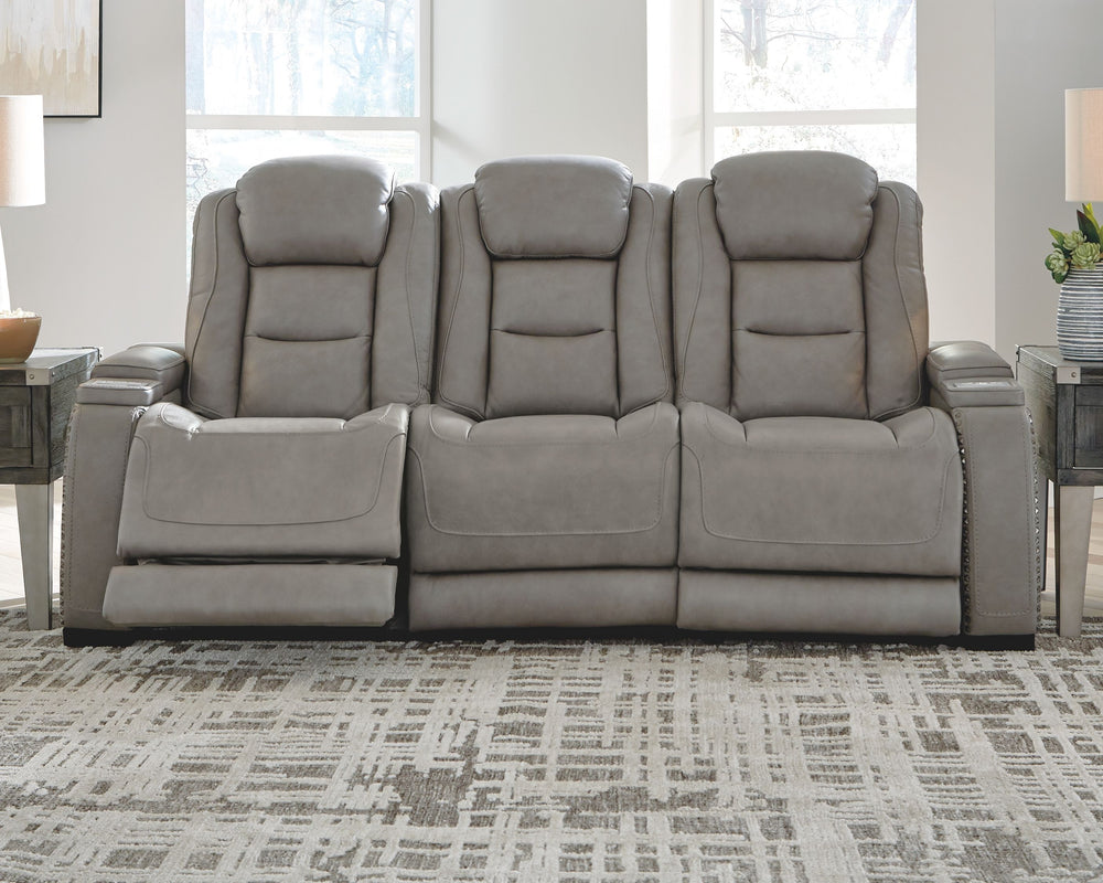 Reserved for him and made for her, this power reclining set delivers all the comfort and style you could ask for. Inspired by sports car interiors, the seating area is covered in real leather for your pleasure, with a â€œperforated automotiveâ€ treatment