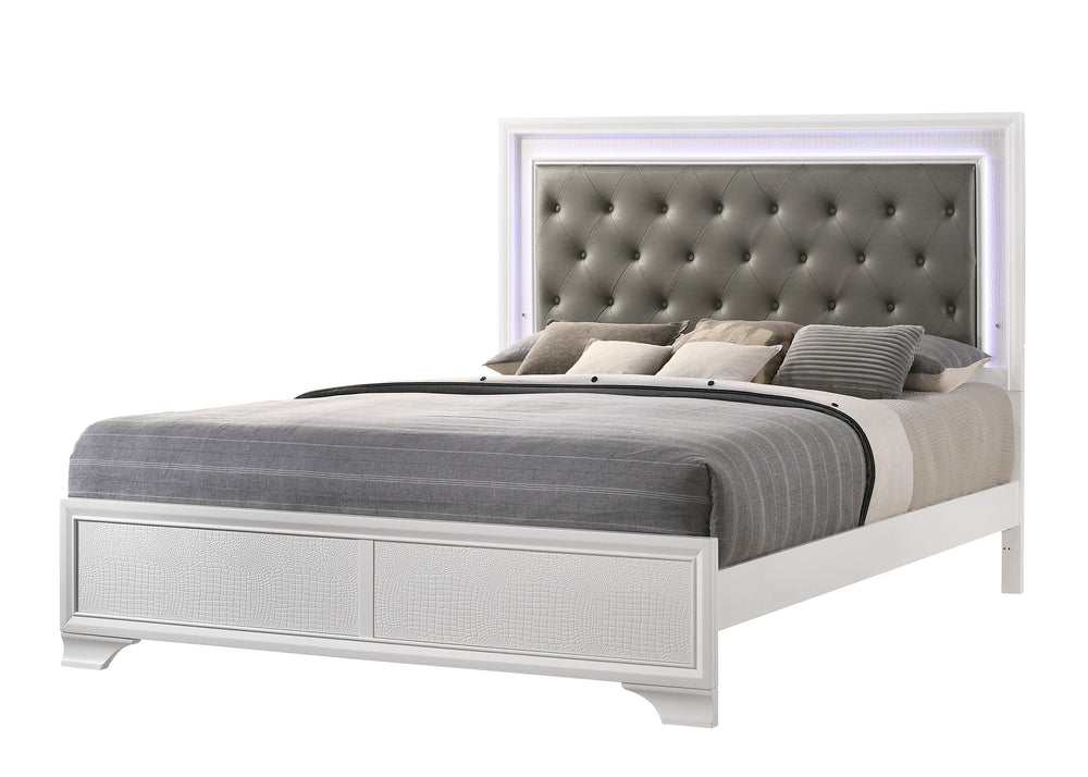 Step into a realm of sophistication and comfort with this stunning bedroom collection. Each piece showcases an exquisite blend of traditional charm and contemporary flair, making a bold statement with its textured surfaces and crisp white finish. The bed,