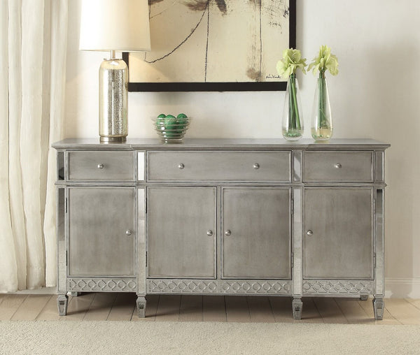 Crafted with past and present in mind, our Kacela dining collection revitalizes and transforms traditional designing ideas. A grand centerpiece, the rectangular table is handsomely finished and enriched by tapered legs and mirror insert top and edges. Pai