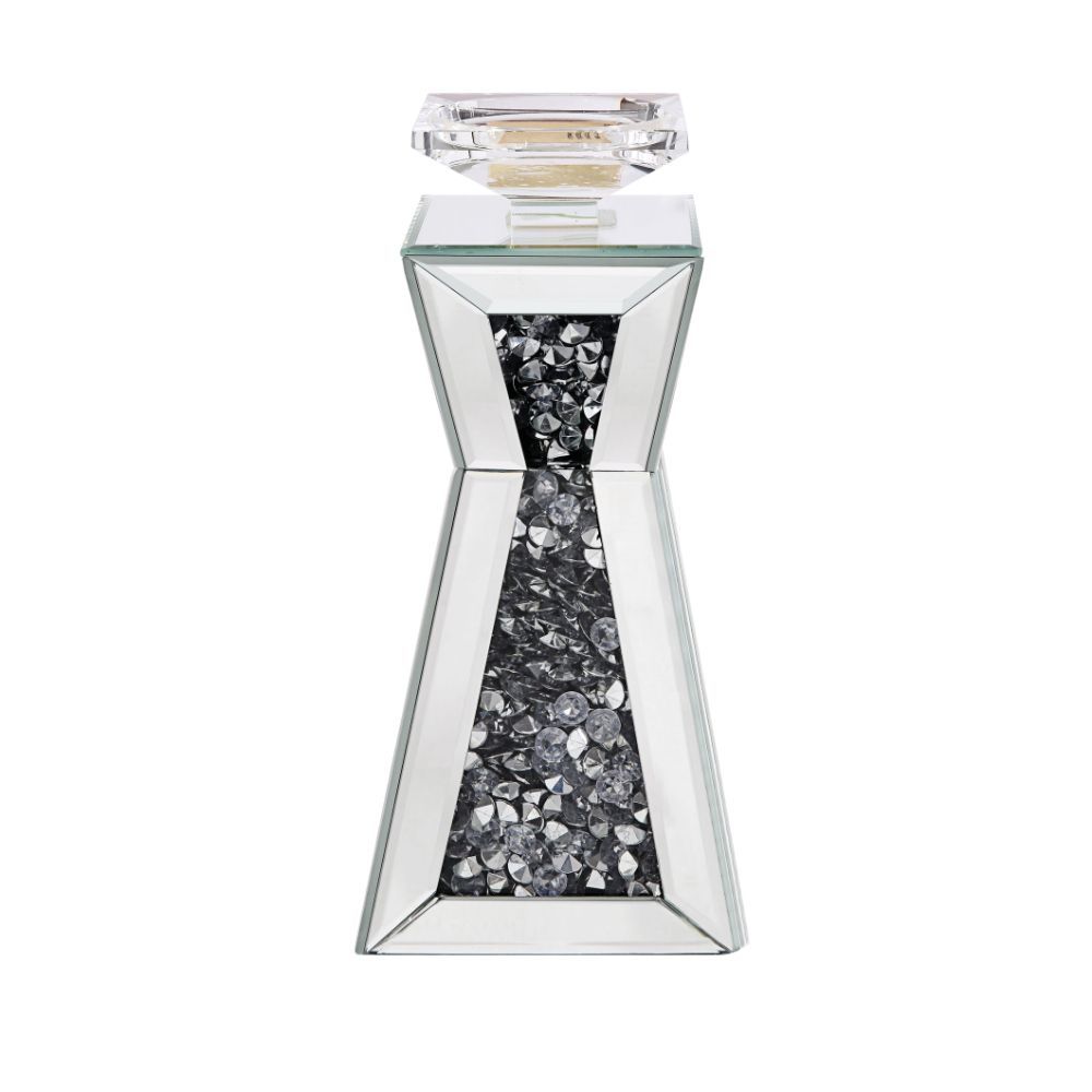 Strut your style with this beautiful and elegant Nowles candleholder collection. With a beautifully crafted mirrored frame and faux gem inlay, it is sure to compliment any arrangement. Available in two different sizes, light it up and be dazzled by the gl