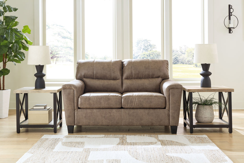 This decidedly modern loveseat proves less is more, bringing simply inviting style to your living room. Take the guesswork out of decoratingâ€”its warm faux leather has a universal appeal, pairing with casual and contemporary aesthetics alike. All you nee