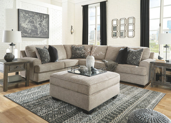 Whether your style is clean and contemporary or cozy modern farmhouse, this generously sized set in a stone-tone neutral upholstery has the corner on style. <h4><b>Bovarian - Stone - LAF Sofa w/Corner Wedge</b></h4> <table width=-"100%-"><colgroup><col st
