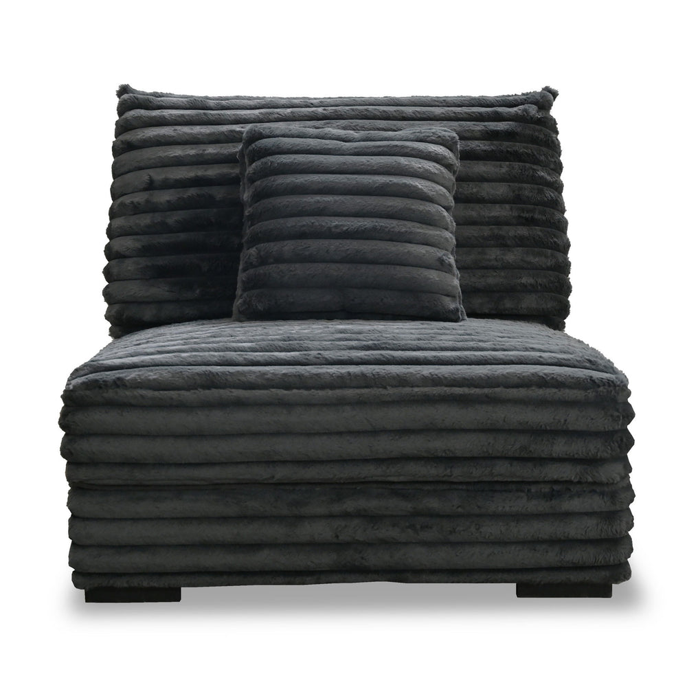 The Embrace Armless Chair with 1 Accent Pillow in charcoal gray offers a perfect blend of comfort and style, enhancing any living space. Upholstered in 100% charcoal gray polyester fabric with a fluffy, blanket-like texture, this chair is designed for ult