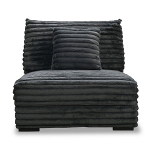 The Embrace Armless Chair with 1 Accent Pillow in charcoal gray offers a perfect blend of comfort and style, enhancing any living space. Upholstered in 100% charcoal gray polyester fabric with a fluffy, blanket-like texture, this chair is designed for ult