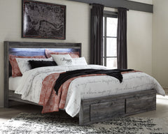 Rest in the beachy style and practicality of this king panel storage bed. Its driftwood and surfer-inspired smoky finish gives this bed a rustic look that-'s perfect for creating an island escape in the room. Two underbed storage drawers provide room for 