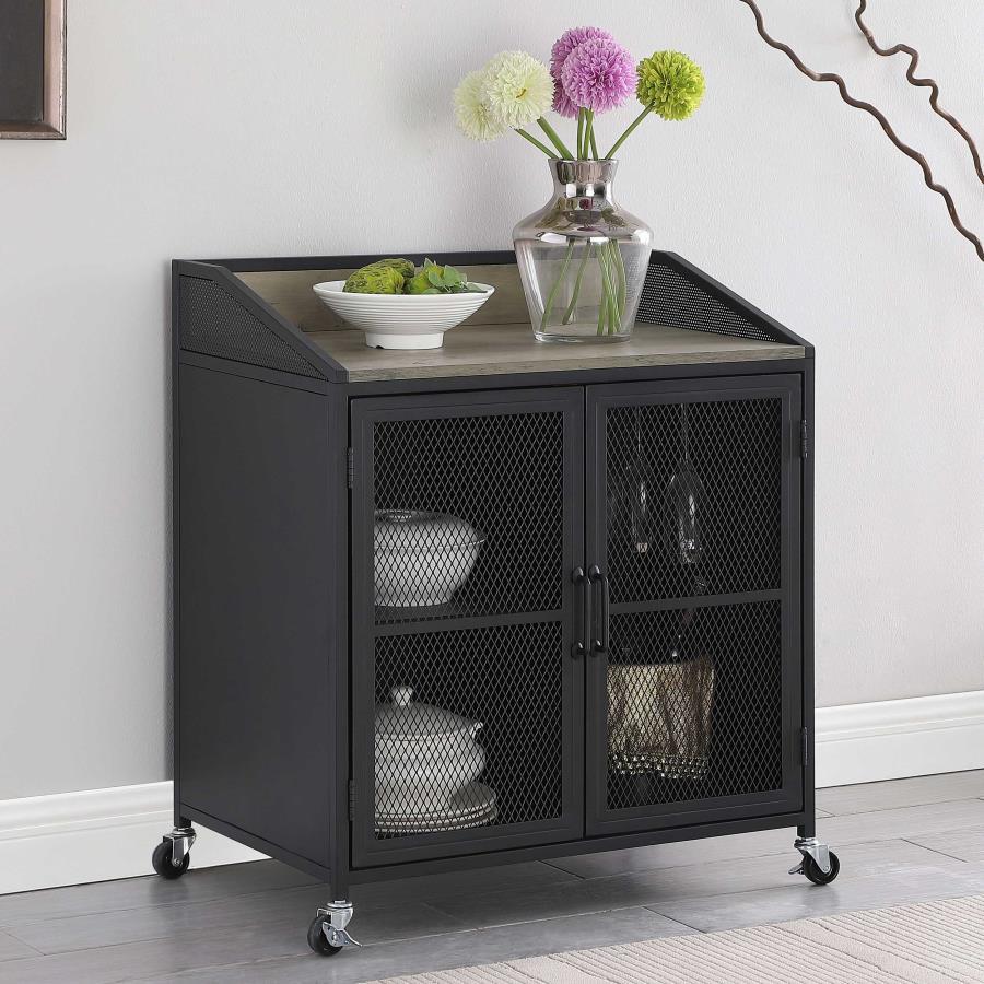 This industrial style wine cabinet offers ample space for keeping favorite vintages, corkscrews and accessories. Designed with a sandy black powder coated finish over a durable steel frame, this functional wine cabinet can be placed in a modern farmhouse 