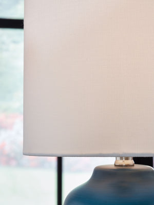  topped by a drum hardback shade that captures the essence of relaxed simplicity.<br><br><b>Additional Dimensions</b><b