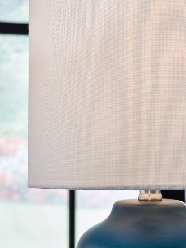  topped by a drum hardback shade that captures the essence of relaxed simplicity.<br><br><b>Additional Dimensions</b><b
