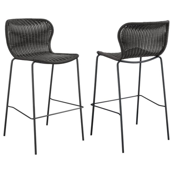 Designed with a mid-century-inspired aesthetic, this contemporary stool offers a charming brown faux rattan seat, nestled in place by an open, airy frame. The seat offers a subtle contoured shape that cradles the torso and offers a comfortable place of re
