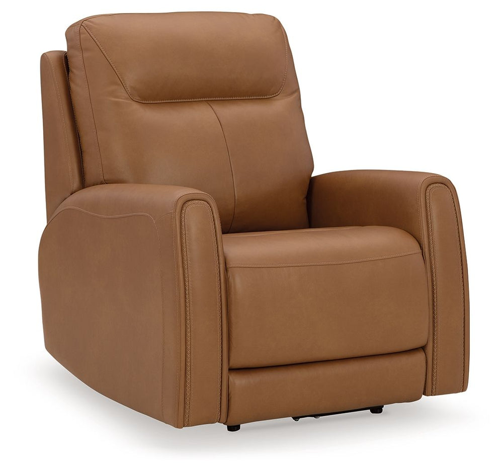 Reserved for him and made for her. This power recliner delivers all the comfort and style you could ask for. Inspired by sports car interiors, the expertly matched leather and faux leather upholstery features jumbo stitching for even more appeal. And the 