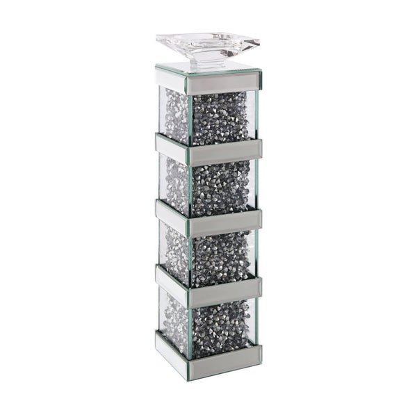 Cast a warm glow over any space in your home with this Noralie candleholder. More than stylish, this piece will bring sophistication to your home with its mirrors and faux gem inlay. This gleaming piece comes in two different sizes to choose the one that 