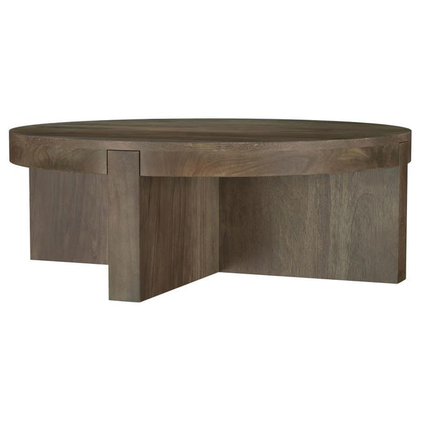  the table receives a dark brown finish to ensure standout style. The round cocktail table is a low