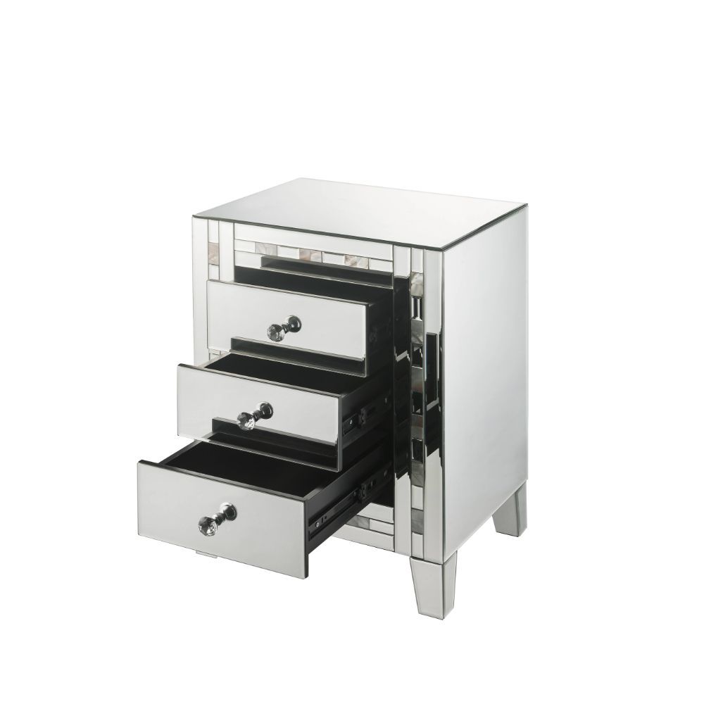 Style and storage abound in the pretty and practical design of the Nasa Side Table. Three drawers offer plentiful enclosed storage for remotes, magazines, or any other items you prefer to keep close at hand. Its three drawers boast crystal knobs and frame