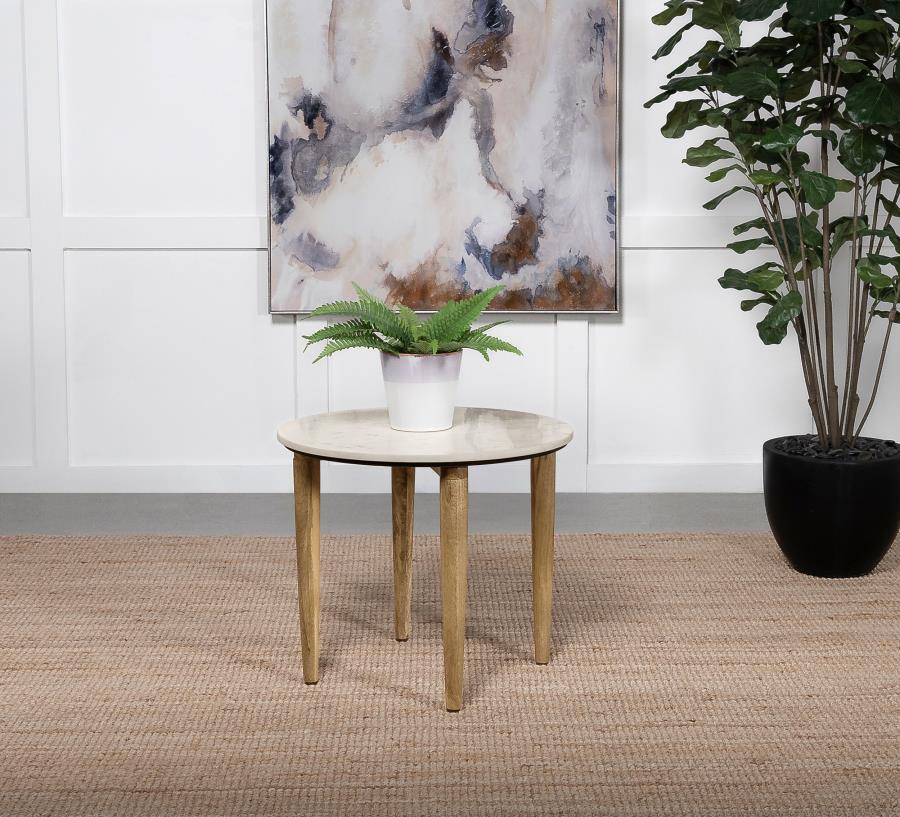 Easy, natural style offers a fresh look to a casual living space as this end table adds low-key yet elegant personality. A rustic feel and warm motif follow this round table crafted in India. Organic materials deliver an earthy aspect to easy-living furni