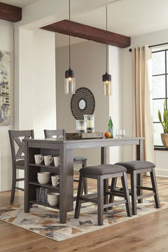 Casual lifestyle design constructed with Acacia veneer and solids. Finished in an antiqued gray wash color. X-back chairs feature solid wood frame and cushioned seat covered with a gray textured polyester fabric with nail head trim. Matching backless benc