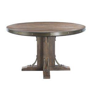 Enhance the industrial, rustic, or farmhouse style of your home with this Rapaela round dining table The single pedestal base provides maximum stability while allowing sufficient leg space for comfortable seating. The metal trim gives this table a modern 