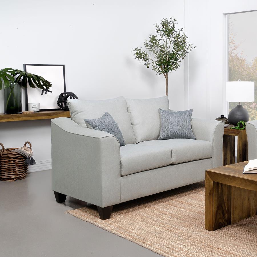 Packing a stylish punch, this modern loveseat is ideal for a compact seating area in your living room or den. Its two-seater profile features plush foam cushions for optimal comfort. The loveseat features sinuous spring decking that adds wonderful support