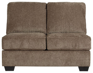 This armless loveseat is made with polyester upholstery. Pairs with other items in the series to make a sectional.<br><br><b>Additional Dimensions</b><br><ul><li>Leg height: 3-"</li><li>Minimum width of doorway for delivery: 32-"</li><li>Seat depth: 23-"<
