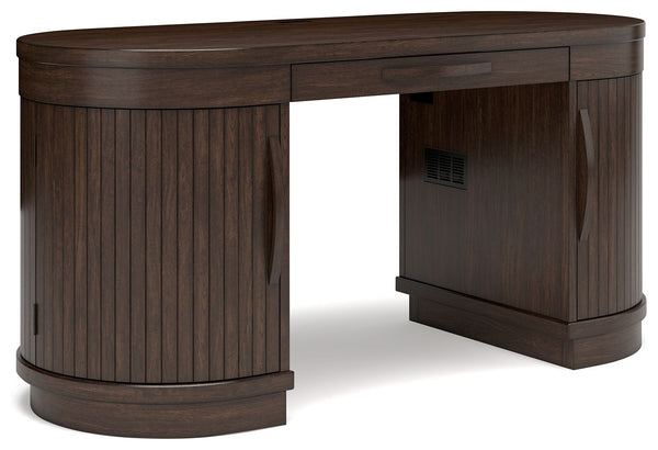 This home office desk is perfectly modern in every way. Finished on both sides in a rich wood tone, it can be floated in a room or used as a divider. Two half round door cabinets, each with an adjustable shelf, deliver a well-organized space for work-from