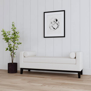  sophisticated living area or master suite with a modern upholstered bench. The backless design includes straight track arms