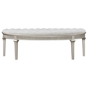  this bench sports a demilune shape that exudes timeless appeal. The ivory fabric upholstered seat showcases chan