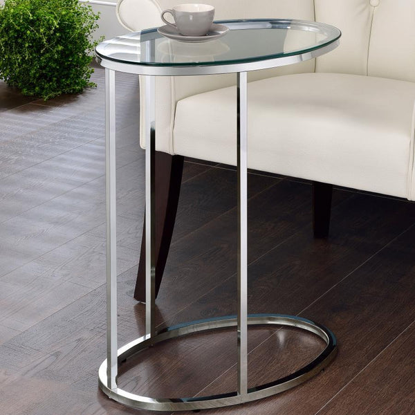  modern design with a clear tempered glass top that offers both durability and elegance. Its minimalist metal frame