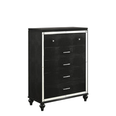 The Valentino 5 Drawer Chest in classic black is a testament to enduring craftsmanship crafted from a blend of manufactured and solid woods, adorned with exquisite embossed inlays. Radiating with glitz and glam, its gleaming finish, mirrored trims, crysta