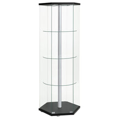 Explore the cutting edge properties of geometric design. Made from glass, this curio cabinet wakes up a contemporary space and puts a new spin on an old classic. Hexagonal in shape, it features a cool center pole for visual effect. A black finish top and 