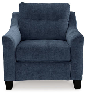  finesses the piece with just the right touch. Gently flared arms and tufted back cushions let you bask in th