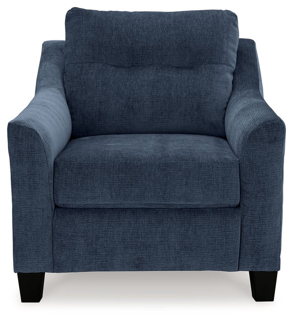  finesses the piece with just the right touch. Gently flared arms and tufted back cushions let you bask in th