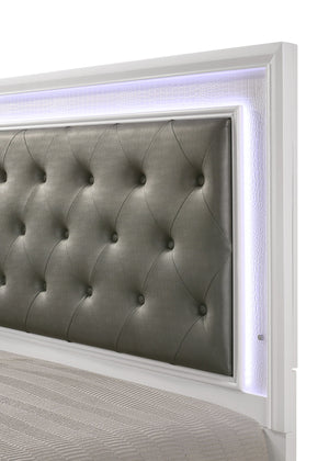  making a bold statement with its textured surfaces and crisp white finish. The bed