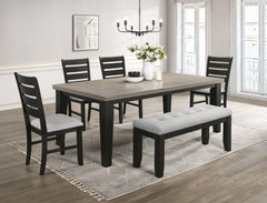 This dining group effortlessly combines farmhouse warmth with modern sophistication, creating a captivating focal point for any dining space. The table features a rich, two-tone design with a beautifully finished wood top and contrasting dark legs, delive